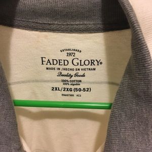 Cream and grey quarter zip sweater.